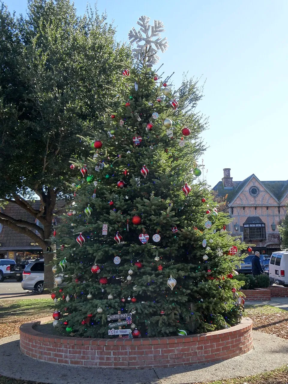 A Christmas tree decorated with red ornaments in the Danish-style village of Solvang